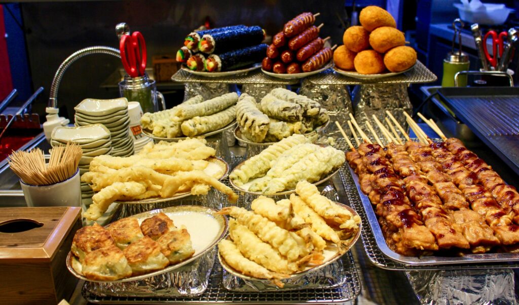 Popular Korean street food vendors in Myeongdong at night
Photo by [Jo Quinn] on Unsplash 